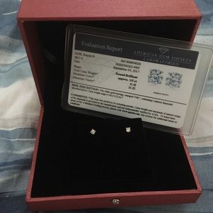 2 white gold earrings w/ 2 natural diamonds